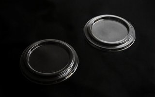 Tapa de cortesía transparente