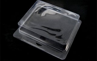 Envase tipo maletín transparente